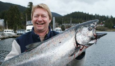 Four happy visitors with their catch from our sport fishing tour in Juneau Alaska