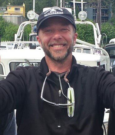 Guide and Captain Derek Oliver